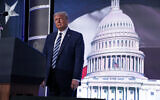 US President Donald Trump stands on stage during the 2020 Council for National Policy Meeting, Aug. 21, 2020, in Arlington, Virginia. (AP Photo/Evan Vucci)