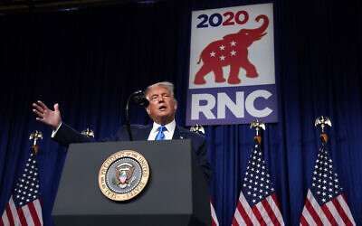 Then-US President Donald Trump speaks onstage during the first day of the Republican National Committee convention in Charlotte, North Carolina, August 24, 2020. (AP Photo/Evan Vucci)
