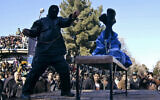 Illustrative: An Iranian officer lashes a man, convicted of rape, at the northeastern city of Sabzevar, Iran, Wednesday, Jan. 16, 2013. (AP Photo/Hossein Esmaeli)