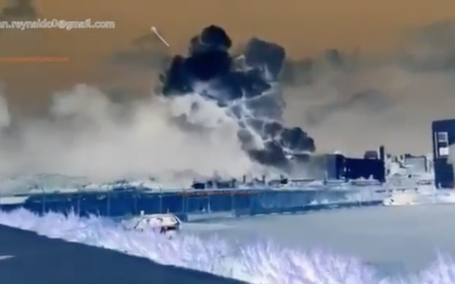 An image from a doctored video claiming to show a missile hitting Beirut's port and causing a massive explosion on August 4, 2020. (Screen capture: Twitter) An image from a doctored video claiming to show a missile hitting Beirut's port and causing a massive explosion on August 4, 2020. (Screen capture: Twitter)