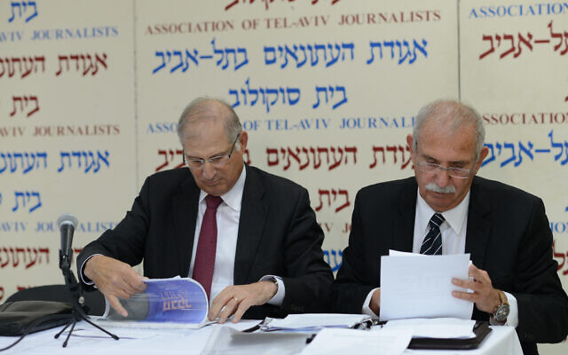 David Shimron, attorney for Likud political party (L) with Yaakov Borovsky at a press conference in Tel Aviv on February 17, 2015. (Ben Kelmer/Flash90) David Shimron, attorney for Likud political party (L) with Yaakov Borovsky at a press conference in Tel Aviv on February 17, 2015. (Ben Kelmer/Flash90)
