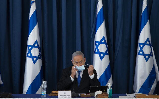 Prime Minister Benjamin Netanyahu and Alternate Prime Minister and Minister of Defense Benny Gantz at the weekly cabinet meeting, at the Ministry of Foreign Affairs in Jerusalem on July 5, 2020. (Amit Shabi/POOL) Prime Minister Benjamin Netanyahu and Alternate Prime Minister and Minister of Defense Benny Gantz at the weekly cabinet meeting, at the Ministry of Foreign Affairs in Jerusalem on July 5, 2020. (Amit Shabi/POOL)