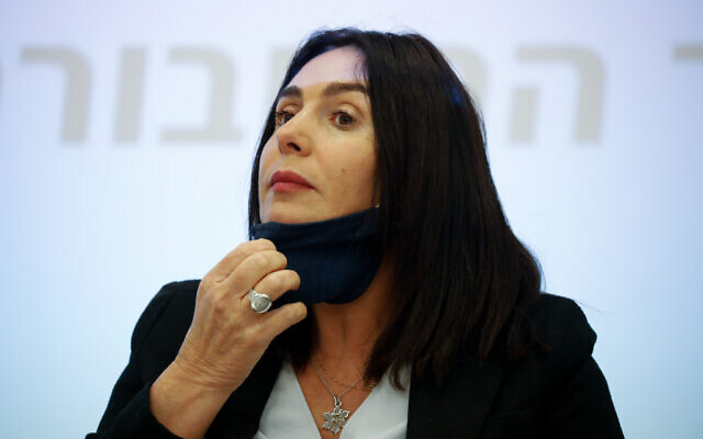 Transportation Minister Miri Regev, who lowered her face mask to speak, during a press conference at the Transportation Ministry in Jerusalem on July 8, 2020. (Olivier Fitoussi/Flash90) Transportation Minister Miri Regev, who lowered her face mask to speak, during a press conference at the Transportation Ministry in Jerusalem on July 8, 2020. (Olivier Fitoussi/Flash90)