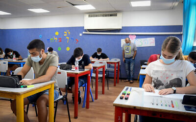 Illustrative: Yehud Comprehensive High School students take their mathematics English matriculation examination (Bagrut), in Yehud, July 8, 2020. (Yossi Zeliger/Flash90)