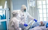 A medical team at the coronavirus unit of Ichilov Hospital in Tel Aviv, July 28, 2020. (Yossi Aloni/Flash90)