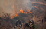 View of a fire near kibbutz Be'eri, caused by incendiary balloons launched from the Gaza Strip, on August 13, 2020. (Yonatan Sindel/Flash90)
