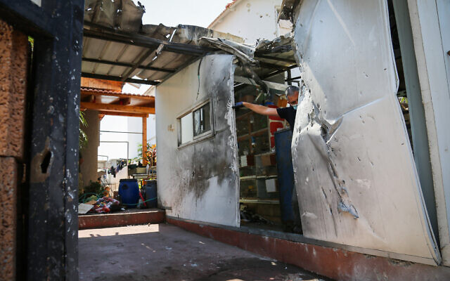 View of damage to a house in the southern Israeli town of Sderot that was caused by fragments of an Iron Dome interceptor missile, which was fired to shoot down incoming rocket fire from the Gaza Strip, on August 16, 2020. (Flash90) View of damage to a house in the southern Israeli town of Sderot that was caused by fragments of an Iron Dome interceptor missile, which was fired to shoot down incoming rocket fire from the Gaza Strip, on August 16, 2020. (Flash90)