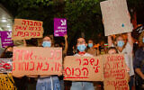 Israelis take part in a demonstration in support of the 16-year-old victim of an alleged gang rape in Eilat, in Haifa on August 20, 2020. (Flash90)