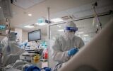 A medical team works at the coronavirus ward of Shamir Medical Center, in Be'er Ya'akov, August 20, 2020 (Yonatan Sindel/ Flash90)