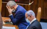 Defense Minister Benny Gantz (left) and Prime Minister Benjamin Netanyahu, seen during a vote to stave off a budget deadline and thus avert elections, at the Knesset on August 24, 2020. (Oren Ben Hakoon/Pool)