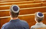 Illustrative: Jewish people at a synagogue. ((Robert Nicholas/Getty Images via JTA)