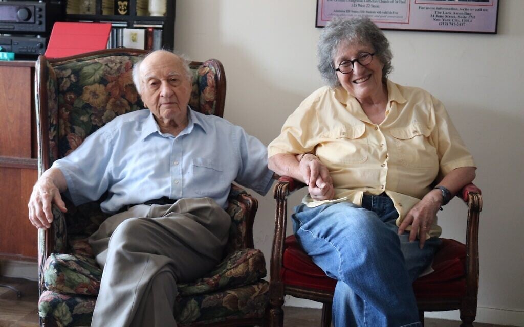 Arnold Greissle, 97, with wife Nancy Bogen, 88, in their New York apartment, 2020. The couple are regular members of the Stammtisch, where Arnold's Viennese potato salad is a must-have each week. (Hannah Harnest/ Times of Israel)
