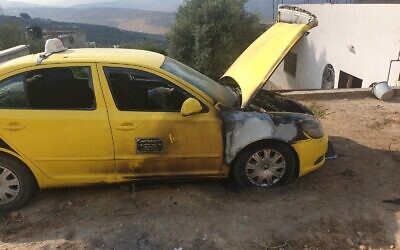 A torched car in the Palestinian village of Fara'ata in the northern West Bank in a suspected hate crime, August 4, 2020. (Fara'ata local council)
