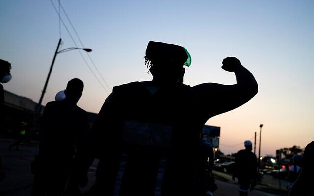 Protesters march against the police shooting of Jacob Blake in Kenosha, Wisconsin, August 26, 2020. (AP Photo/David Goldman) Protesters march against the police shooting of Jacob Blake in Kenosha, Wisconsin, August 26, 2020. (AP Photo/David Goldman)