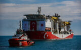 Turkey's drilling ship, Fatih, sails through the Bosphorus toward the Black Sea in Istanbul, May 29, 2020. (AP Photo/Emrah Gurel)