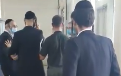 Israeli Bratslav worshipers held at an airport in Ukraine, August 27, 2020. (Screen capture: Twitter)