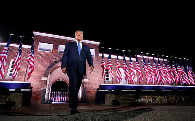 Former US president Donald Trump walks to the stage after Vice President Mike Pence delivered a speech on the third day of the Republican National Convention at Fort McHenry National Monument and Historic Shrine in Baltimore, Maryland, August 26, 2020. (AP/Andrew Harnik)