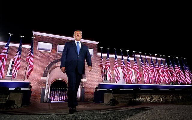 Former US president Donald Trump walks to the stage after Vice President Mike Pence delivered a speech on the third day of the Republican National Convention at Fort McHenry National Monument and Historic Shrine in Baltimore, Maryland, August 26, 2020. (AP/Andrew Harnik) Former US president Donald Trump walks to the stage after Vice President Mike Pence delivered a speech on the third day of the Republican National Convention at Fort McHenry National Monument and Historic Shrine in Baltimore, Maryland, August 26, 2020. (AP/Andrew Harnik)
