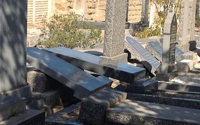 Illustrative: The aftermath of vandalism at the Oudtshoorn Jewish cemetery in South Africa. (Cape SAJB via JTA) Illustrative: The aftermath of vandalism at the Oudtshoorn Jewish cemetery in South Africa. (Cape SAJB via JTA)