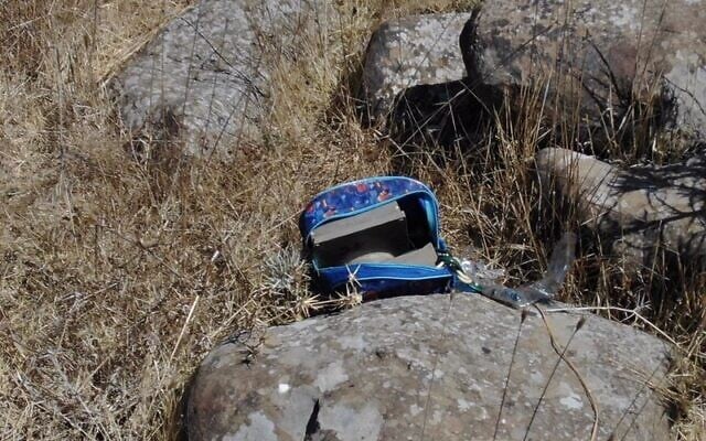 A bag with explosive devices inside it is seen near the scene where four Syrian suspects were killed Sunday night, after crossing the border and planting bombs, August 3, 2020. (Israel Defense Forces) A bag with explosive devices inside it is seen near the scene where four Syrian suspects were killed Sunday night, after crossing the border and planting bombs, August 3, 2020. (Israel Defense Forces)