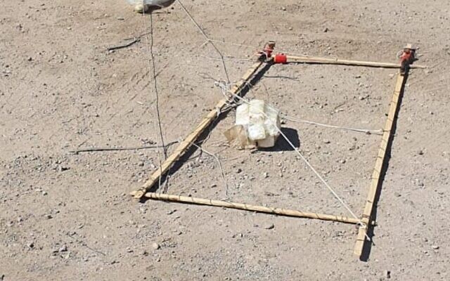 A suspected airborne explosive device is seen in the industrial area of the southern city of Arad, August 6, 2020. (Israel Police) A suspected airborne explosive device is seen in the industrial area of the southern city of Arad, August 6, 2020. (Israel Police)