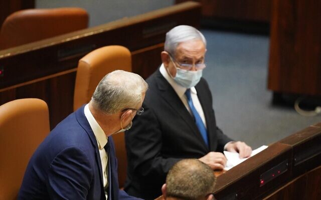 Defense Minister Benny Gantz (L) and Prime Minister Benjamin Netanyahu in the Knesset plenum on August 24, 2020. (Knesset Spokesperson's Office) Defense Minister Benny Gantz (L) and Prime Minister Benjamin Netanyahu in the Knesset plenum on August 24, 2020. (Knesset Spokesperson's Office)