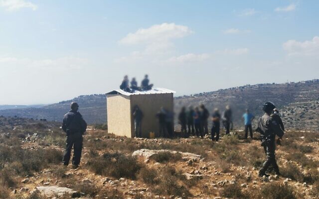 Border Police evict teenagers from Ma'ale Shai, an illegal outpost established in Palestinian-controlled Area B in the West Bank (Israel Police) Border Police evict teenagers from Ma'ale Shai, an illegal outpost established in Palestinian-controlled Area B in the West Bank (Israel Police)