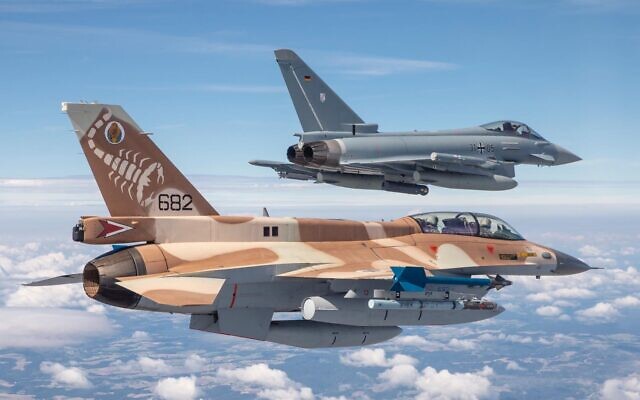 A German air force Eurofighter and an Israeli Air Force F-16 jet fly in formation near Munich in commemoration of the 1972 Munich Olympic Games massacre in which 11 Israeli athletes were killed, on August 18, 2020. (Israel Defense Forces)