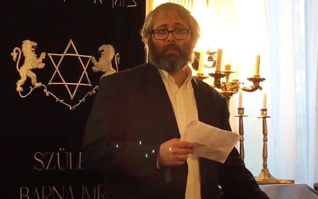 Rabbi Peter Finali speaks at a Budapest synagogue in 2016. (Peter Finali/YouTube via JTA) Rabbi Peter Finali speaks at a Budapest synagogue in 2016. (Peter Finali/YouTube via JTA)