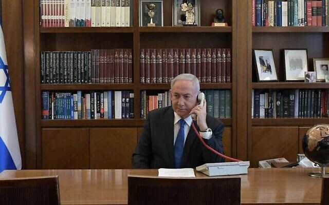 Prime Minister Benjamin Netanyahu at his office in Jerusalem on a phone call with UAE leader Mohammed Bin Zayed on August 13, 2020. (Kobi Gideon/PMO) Prime Minister Benjamin Netanyahu at his office in Jerusalem on a phone call with UAE leader Mohammed Bin Zayed on August 13, 2020. (Kobi Gideon/PMO)