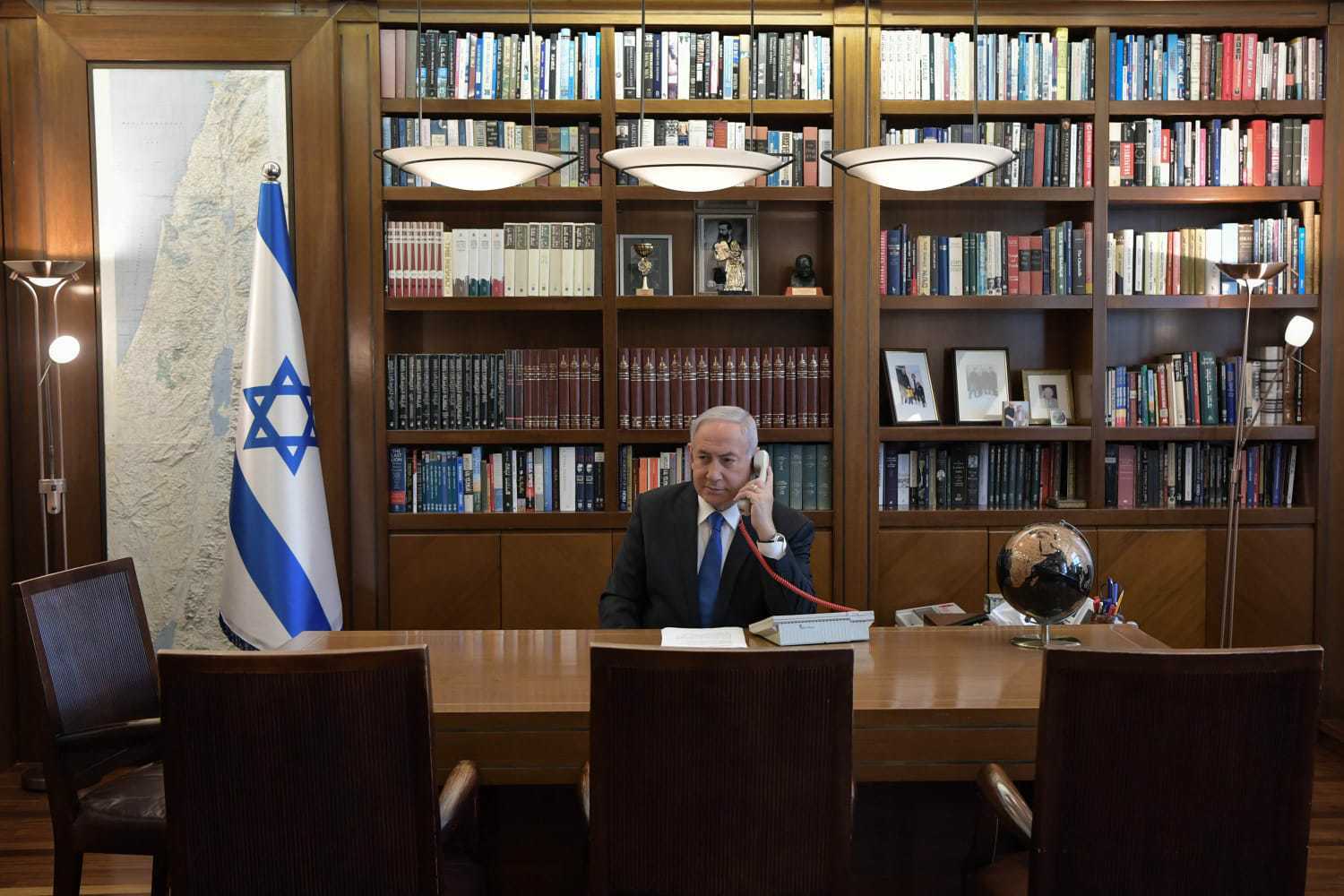Prime Minister Benjamin Netanyahu at his office in Jerusalem on a phone call with UAE leader Mohammed Bin Zayed on August 13, 2020. (Kobi Gideon/PMO) Prime Minister Benjamin Netanyahu at his office in Jerusalem on a phone call with UAE leader Mohammed Bin Zayed on August 13, 2020. (Kobi Gideon/PMO)