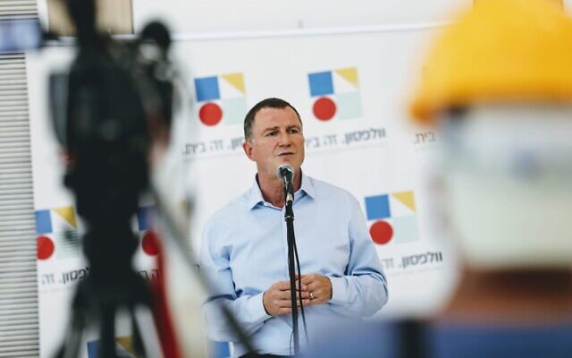 In this photo released by the Health Ministry on August 4, 2020, Health Minister Yuli Edelstein speaks during a visit to Wolfson Medical Center in Holon. (Shlomi Yosef) In this photo released by the Health Ministry on August 4, 2020, Health Minister Yuli Edelstein speaks during a visit to Wolfson Medical Center in Holon. (Shlomi Yosef)