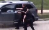 Police officer fires multiple shots at a Black man in Kenosha, Wisconsin, August 23, 2020 (Screen grab/Twitter)