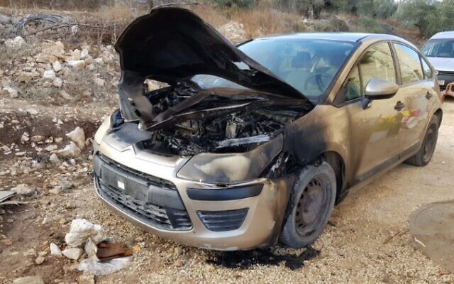 Family car set alight in West Bank Palestinian village of Asira al-Qibliya in apparent hate crime, August 28, 2020 (Courtesy Yesh Din) Family car set alight in West Bank Palestinian village of Asira al-Qibliya in apparent hate crime, August 28, 2020 (Courtesy Yesh Din)