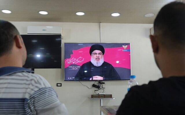 Lebanese men watch Hassan Nasrallah, head of the country's Shiite terror group Hezbollah group, during a televised speech, at a coffee shop in the southern suburbs of the capital Beirut, on August 30, 2020, (ANWAR AMRO / AFP) Lebanese men watch Hassan Nasrallah, head of the country's Shiite terror group Hezbollah group, during a televised speech, at a coffee shop in the southern suburbs of the capital Beirut, on August 30, 2020, (ANWAR AMRO / AFP)