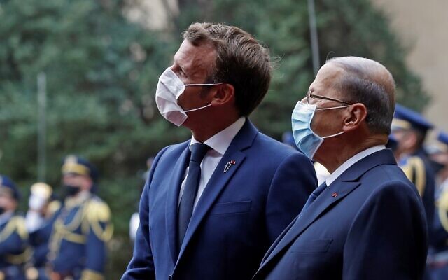 French President Emmanuel Macron (L) meets with Lebanese President Michel Aoun at the Presidential palace in Baabda, east of the Lebanese capital Beirut, on September 1, 2020. (Photo by GONZALO FUENTES / POOL / AFP) French President Emmanuel Macron (L) meets with Lebanese President Michel Aoun at the Presidential palace in Baabda, east of the Lebanese capital Beirut, on September 1, 2020. (Photo by GONZALO FUENTES / POOL / AFP)