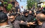 Illustrative: Hamas' political bureau chief Ismail Haniyeh greets supporters during a visit to the Ein el-Hilweh camp, Lebanon's largest Palestinian refugee camp, near the southern coastal city of Sidon on September 6, 2020. (Mahmoud ZAYYAT / AFP)