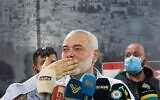 Ismail Haniyeh gestures to supporters during a visit to the Ein el-Hilweh camp, Lebanon's largest Palestinian refugee camp, near the southern coastal city of Sidon on September 6, 2020. (Mahmoud Zayyat/AFP)
