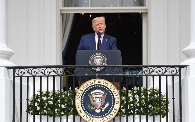 US President Donald Trump speaks from the Truman Balcony at the White House during the signing ceremony of the Abraham Accords where the countries of Bahrain and the United Arab Emirates recognize Israel, on the South Lawn of the White House in Washington, DC, September 15, 2020.(SAUL LOEB / AFP) US President Donald Trump speaks from the Truman Balcony at the White House during the signing ceremony of the Abraham Accords where the countries of Bahrain and the United Arab Emirates recognize Israel, on the South Lawn of the White House in Washington, DC, September 15, 2020.(SAUL LOEB / AFP)