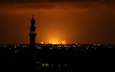 Illustrative: Smoke and flames are seen following an Israeli airstrike in the Khan Younis town of the southern Gaza Strip on September 16, 2020 following rocket fire on Israel. (SAID KHATIB / AFP)