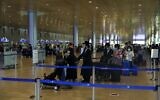 Passengers pictured at Ben Gurion Airport on September 24, 2020, during the Coronavirus pandemic. (Ahmad GHARABLI / AFP)
