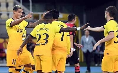 Erik Lamela (L) of Tottenham Hotspur celebrates with teammates after scoring a goal during the UEFA Europa League qualifying round match between Shkendija and Tottenham Hotspur at Philip II Arena in Skopje, Macedonia, on September 24, 2020. (Robert Atanasovski/AFP)
