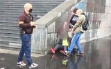 This grab taken from a video obtained by AFP shows French police detaining an alleged suspect after several people were injured near the former offices of the French satirical magazine Charlie Hebdo following an attack by a man wielding a knife in Paris on September 25, 2020 (Laura CAMBAUD / AFP)