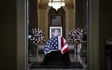 The casket of late Supreme Court Justice Ruth Bader Ginsburg is seen in Statuary Hall in the US Capitol, to lie in state in Washington, DC, on September 25, 2020. (Sarah Silbiger / POOL / AFP)