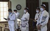 Illustrative: Jews pray during Yom Kippur, also known as the Day of Atonement, at the Magen Abraham Synagogue in Ahmedabad, India on September 28, 2020. (Sam Panthaky/AFP)