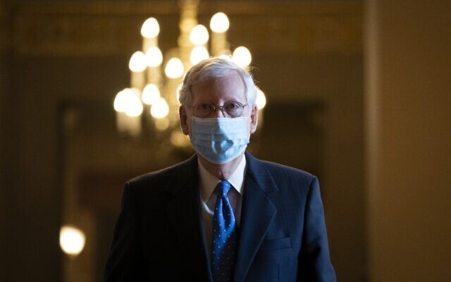 Senate Majority Leader Mitch McConnell leaves his office and walks to the Senate floor at the US Capitol on September 23, 2020, in Washington. (Drew Angerer/Getty Images/AFP) Senate Majority Leader Mitch McConnell leaves his office and walks to the Senate floor at the US Capitol on September 23, 2020, in Washington. (Drew Angerer/Getty Images/AFP)