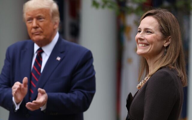 US President Donald Trump (L) introduces 7th U.S. Circuit Court Judge Amy Coney Barrett as his nominee to the Supreme Court in the Rose Garden at the White House September 26, 2020 in Washington, DC. (Chip Somodevilla/Getty Images/AFP) US President Donald Trump (L) introduces 7th U.S. Circuit Court Judge Amy Coney Barrett as his nominee to the Supreme Court in the Rose Garden at the White House September 26, 2020 in Washington, DC. (Chip Somodevilla/Getty Images/AFP)