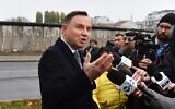 President Andrzej Duda of Poland speaks to the media in front of remains of the Berlin Wall on November 9, 2019. (John Macdougall/AFP via Getty Images)