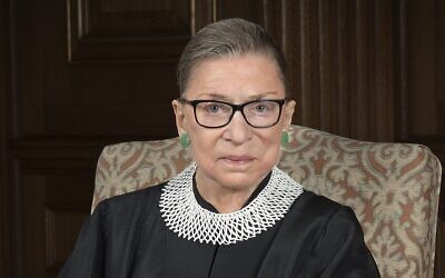 The late US Supreme Court Justice Ruth Bader Ginsburg, in her signature lace jabot, one of which was donated by Ginsburg before her death to Tel Aviv's Museum of the Jewish People. (Courtesy Supreme Court of the United States)