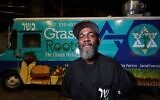 Troy Harris in front of his Grassroots kosher food truck. (Joseph Kaczmarek vis JTA)